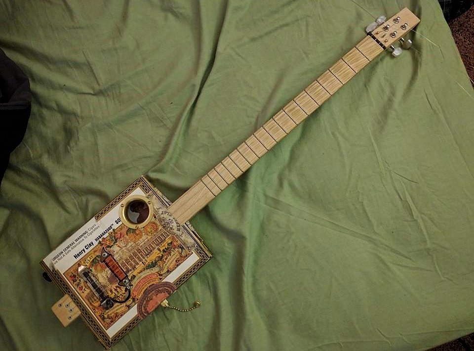 Terry C.'s 3-string guitar gift built with moped parts