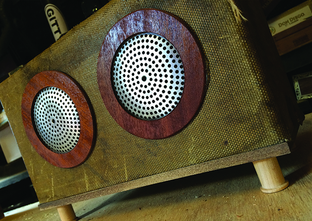 Finished tweed amplifier with speaker rings and grills installed