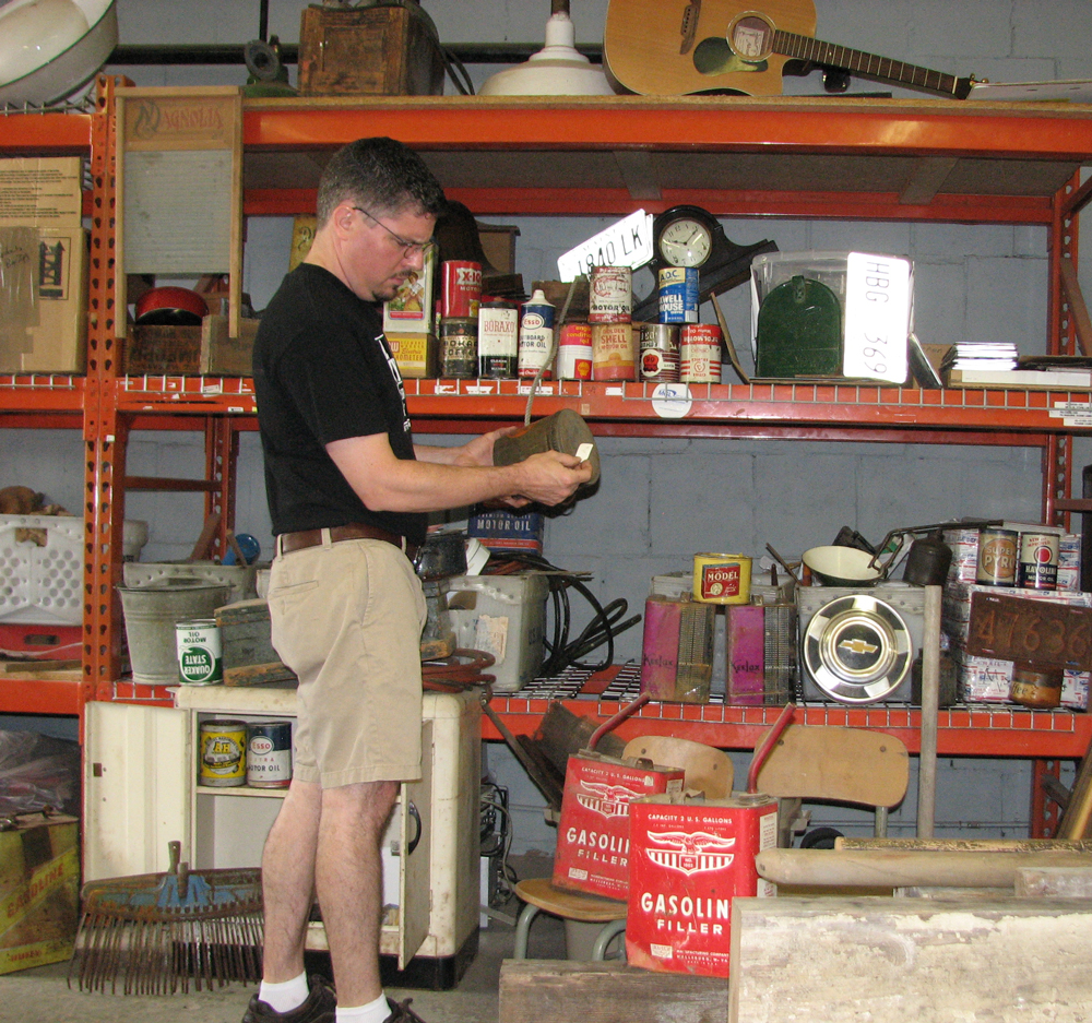 Ben "Gitty" Baker inspecting recently reclaimed items