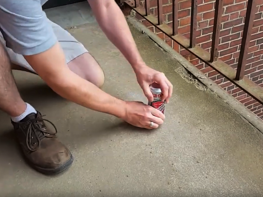 Ben twists the can during the process