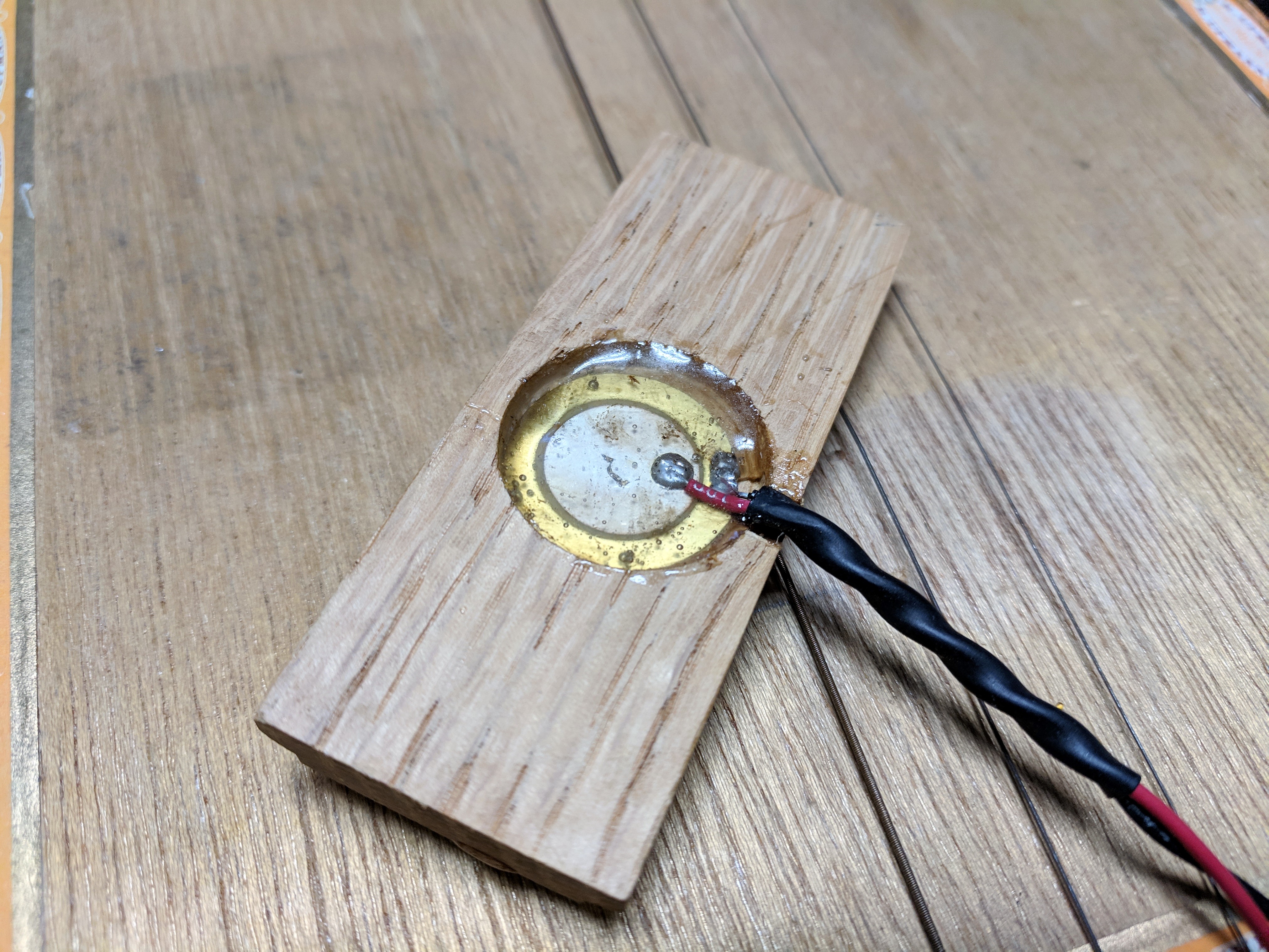 Disk Piezo Glued Into Bridge