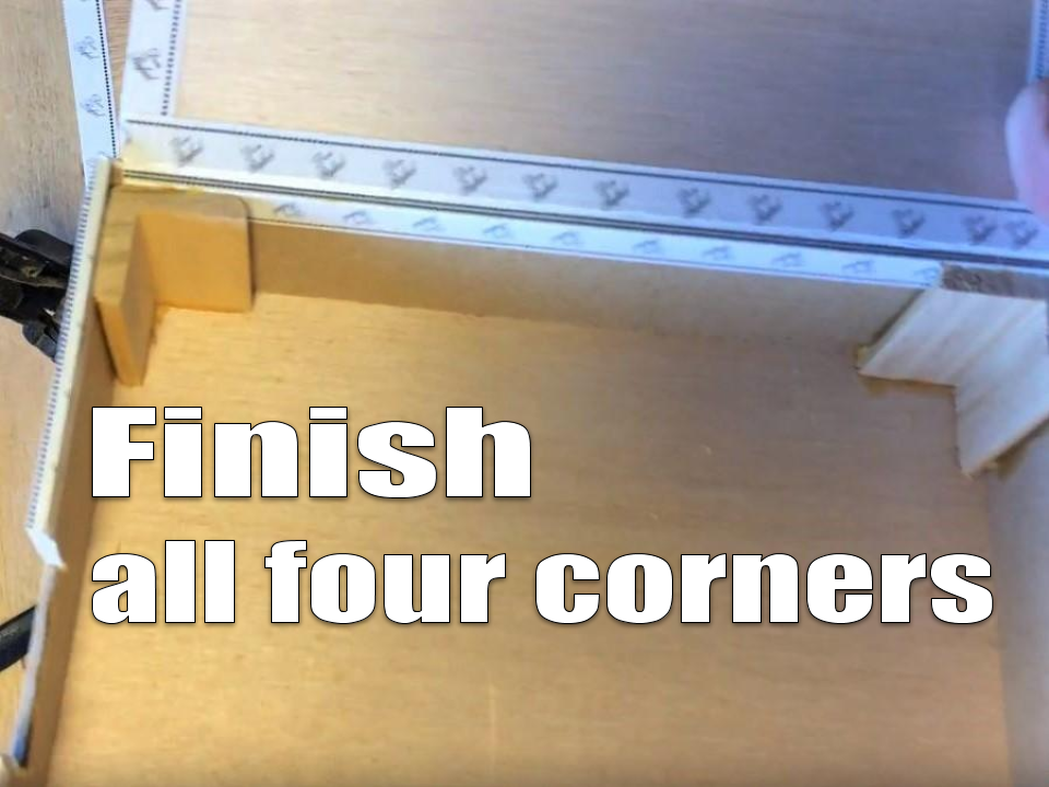 Corner molding glued inside multiple box corners