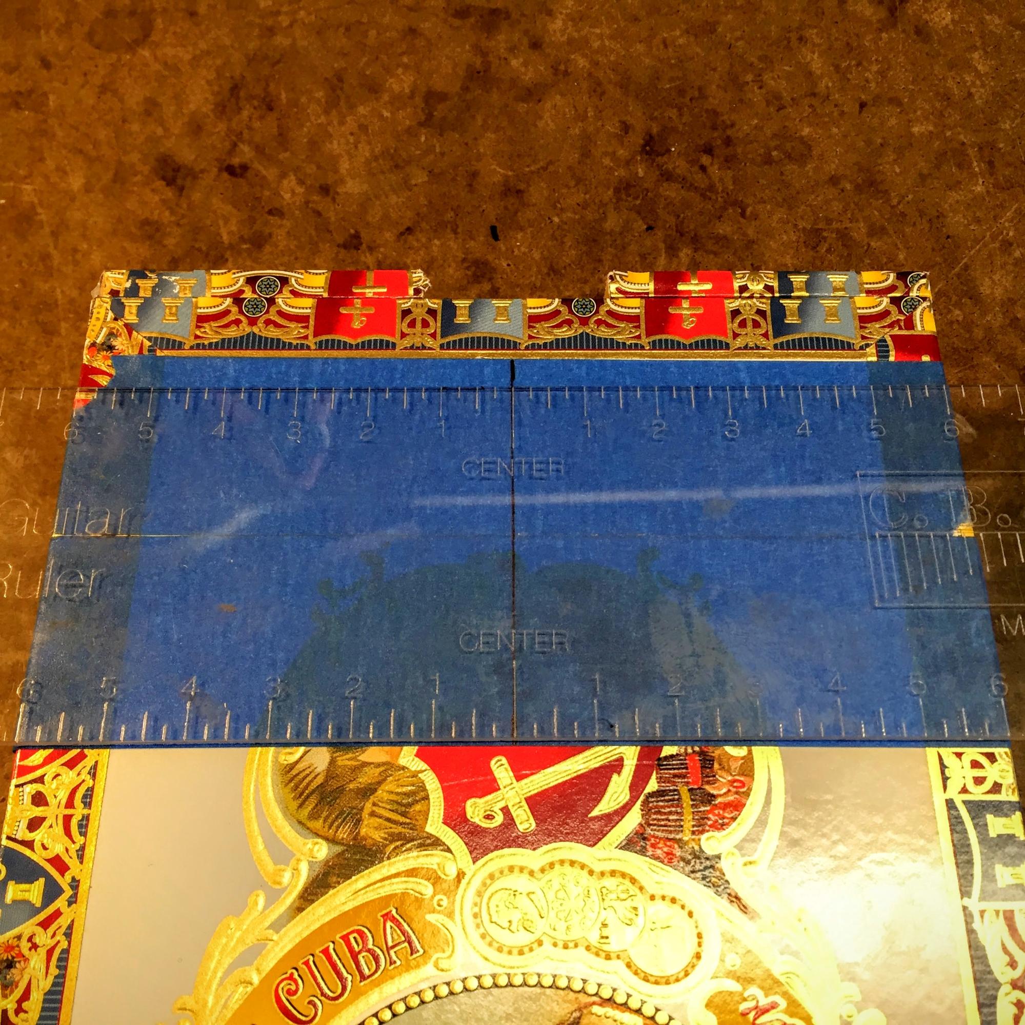 Find the box lid center with a centering-ruler