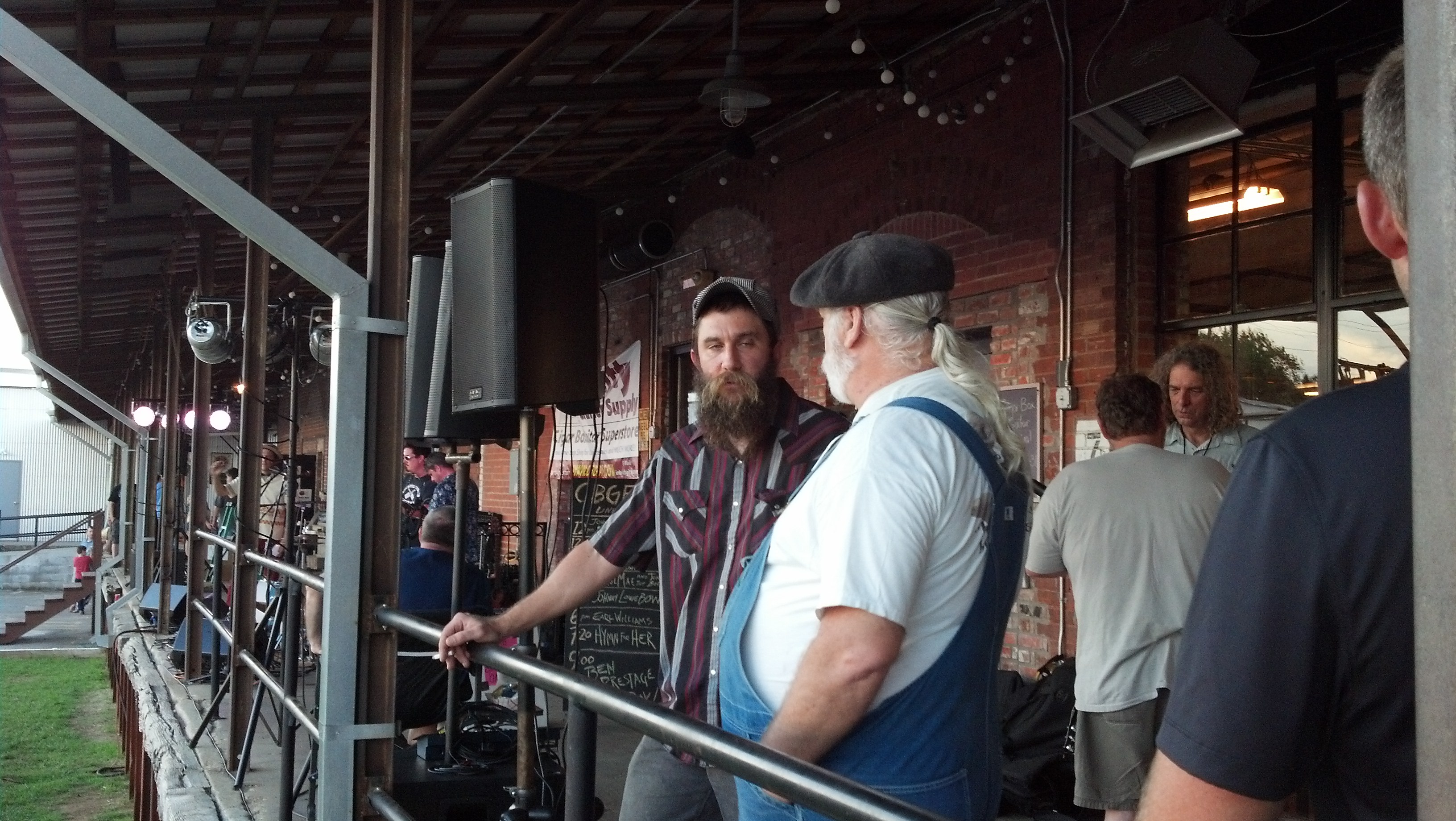 Ben Prestage and Microwave Dave talk shop while Johnny Lowebow works a sale in the background.