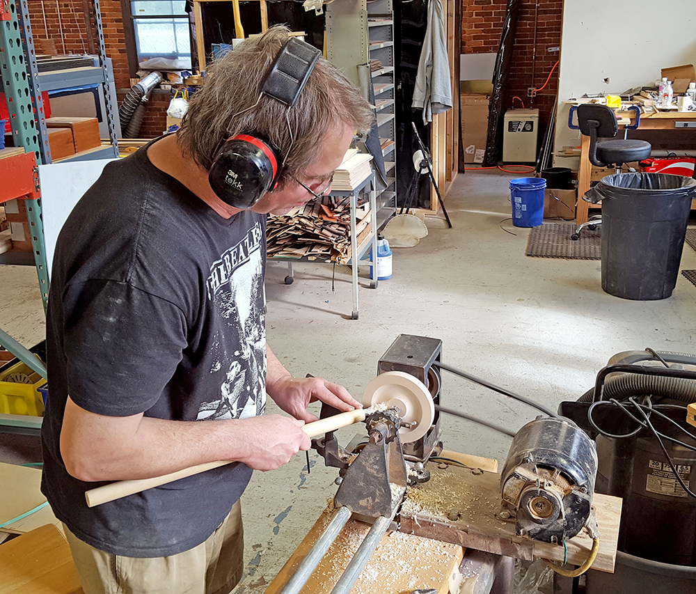 Jeff working on making a prototype spun cone form on Grandpa Baker's old lathe