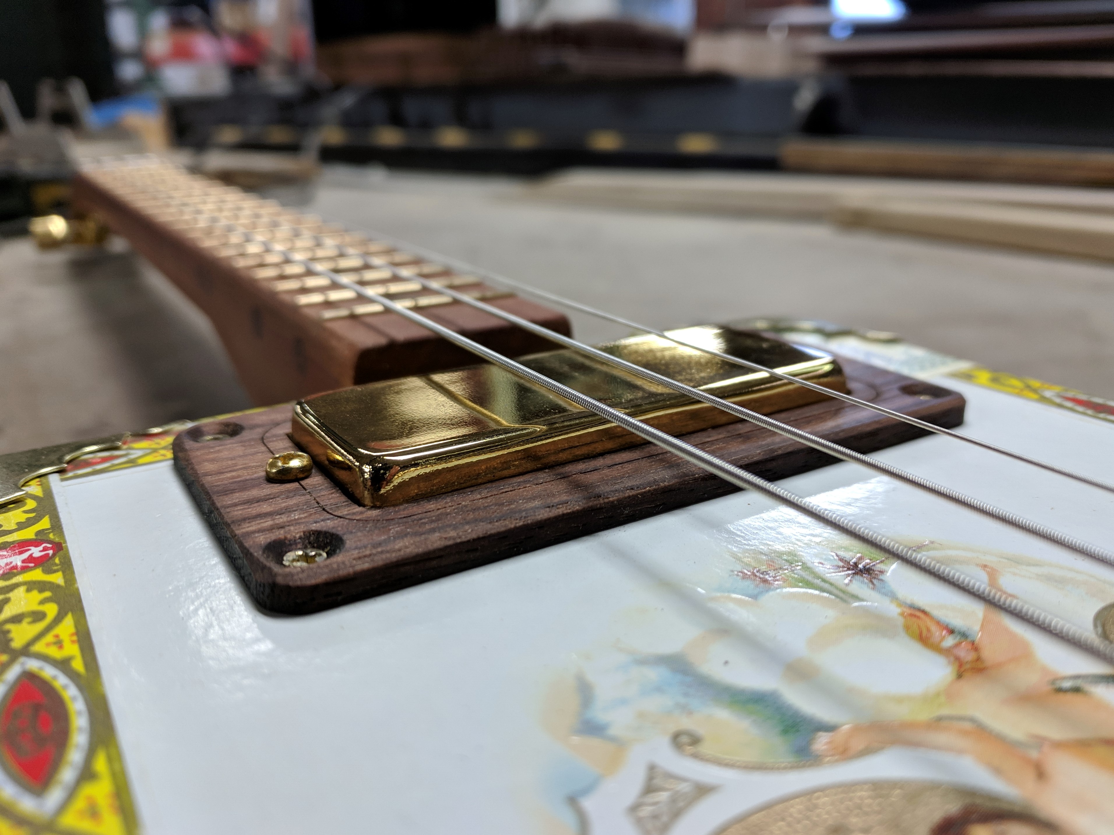 Strings over a mini-humbucker pickup