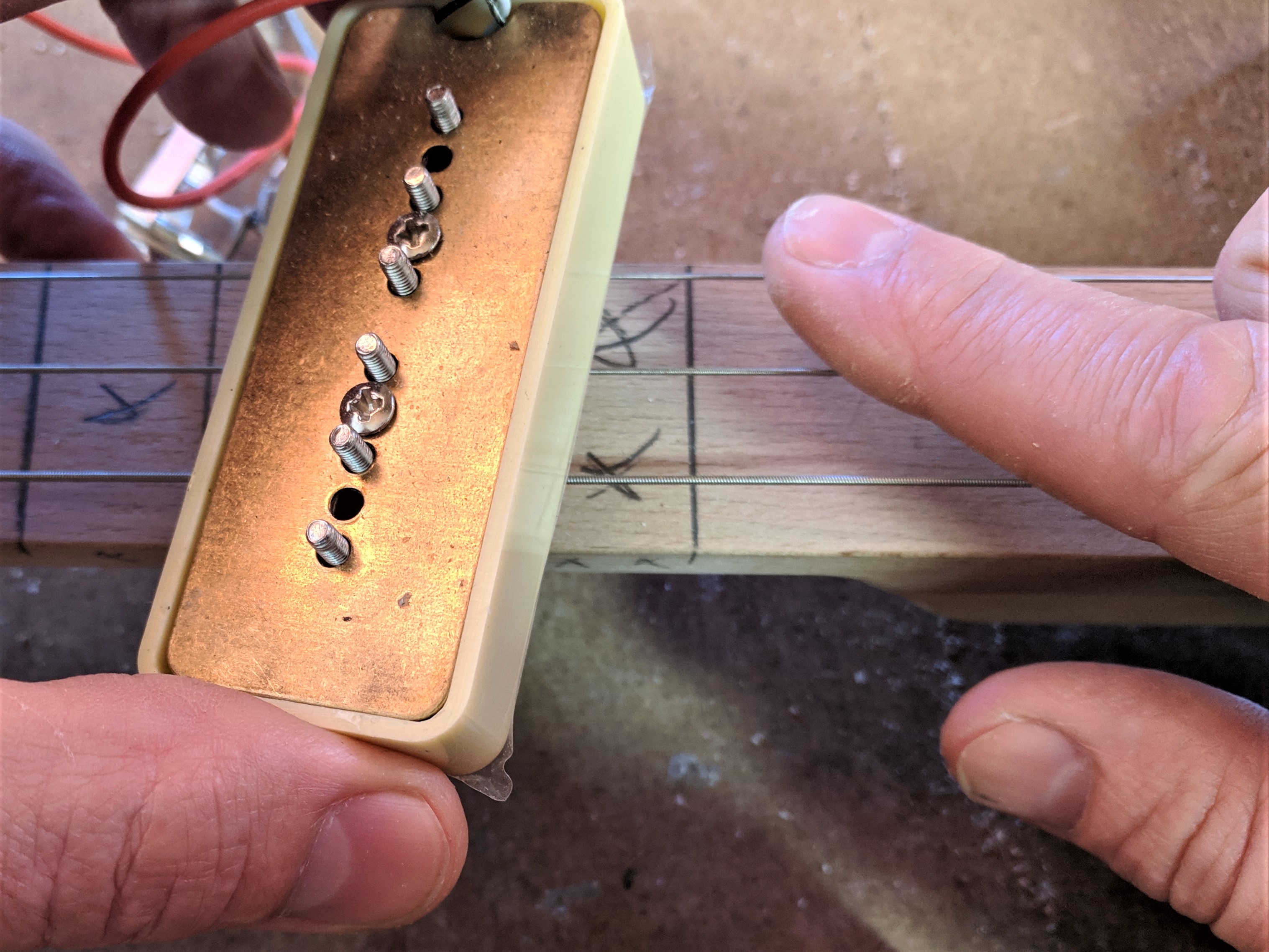 Testing magnetic pickup over nickel-wound cigar box guitar strings